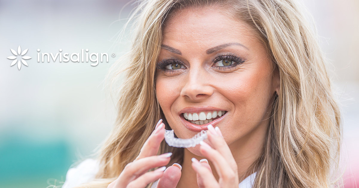 woman with clear aligners