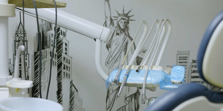 exam room with wall mural of new york city