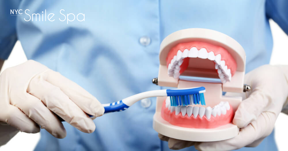 toothbrush brushing fake teeth